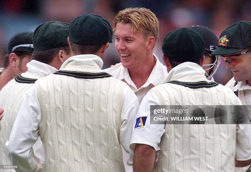 New Australian pace sensation Brett Lee (C) is con