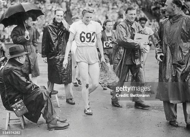 London, England: Mrs. Blankers-Koen , won her third Olympic title when she won the 200 Meters event at Wembley today. She had previously won the 100...