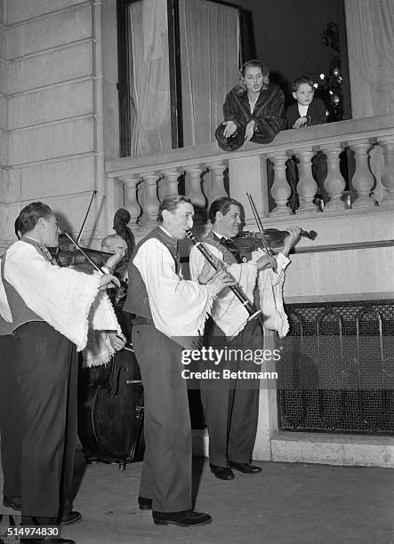 Paris: Gypsy Serenade. The ever-beautiful Ingrid Bergman and her son, Robertino share astonishment and delight as Hungarian musicians serenade the...