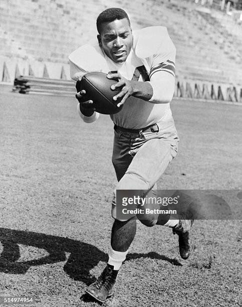 Fullback Jim Brown of Syracuse has been named to the United Press All-American team. Brown from Manhasset, New York, weighs 210, and stands six-two.