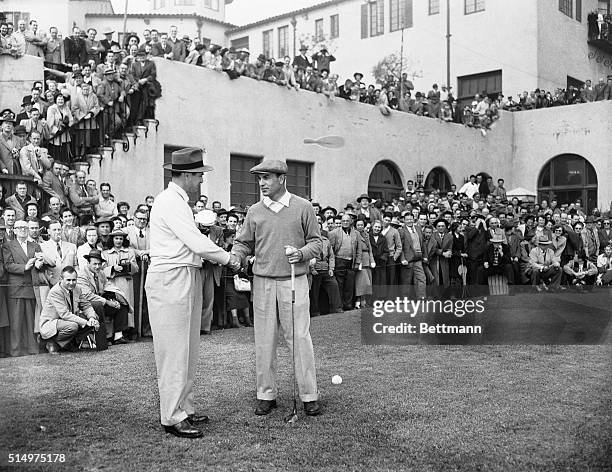 Los Angeles Open Golf Playoff- Ben Hogan and Sam Snead are shown shaking hands as they are about to tee off on the first hole.