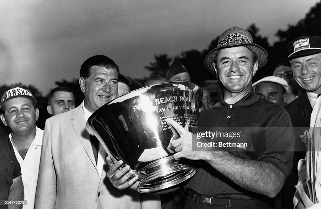 Sammy Snead Pointing to Trophy