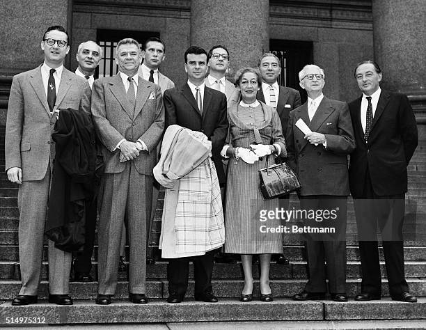 Members of the Songwriters Protective Association pose on the steps of Federal Court here September 17th, before a spokesman for the group told the...