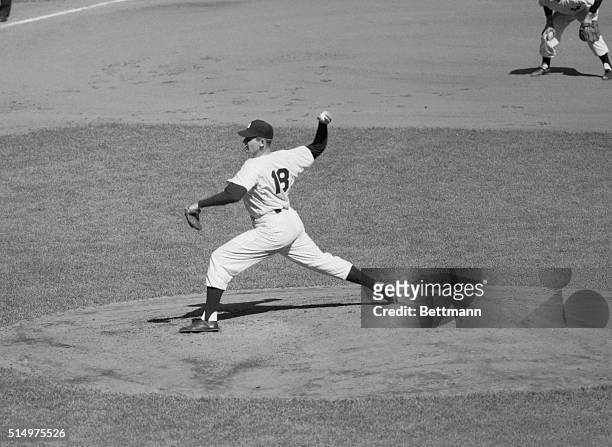 Larsen Pitches Perfect Game. New York: Yankee right-hand hurler Don Larsen shows the form he used on the mound at Yankee Stadium here as he pitched...