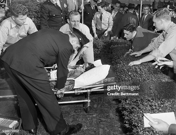 Washington, D.C.- The body of Griselio Torresola is wheeled from Blair House after he was shot dead by police during his assassination attempt on...