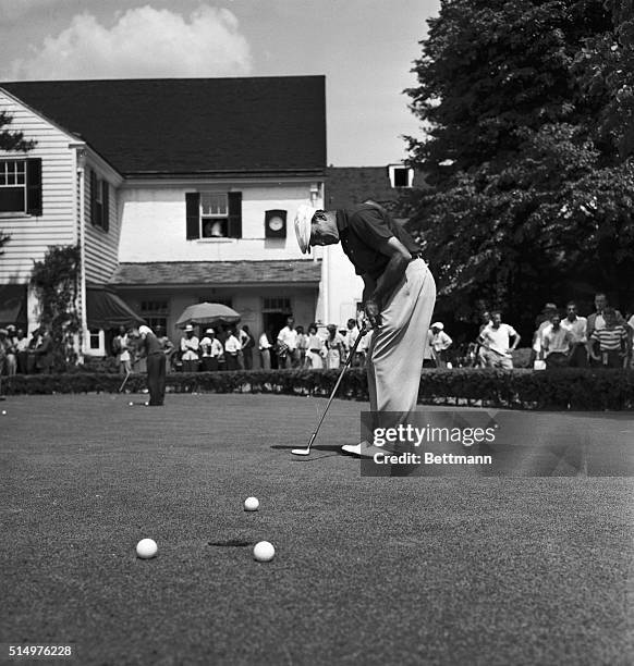 Putting here is Texas' Ben Hogan, one of the contestants in the 50th U.S. Open Championship, which gets underway at the Merion Golf Club tomorrow. He...