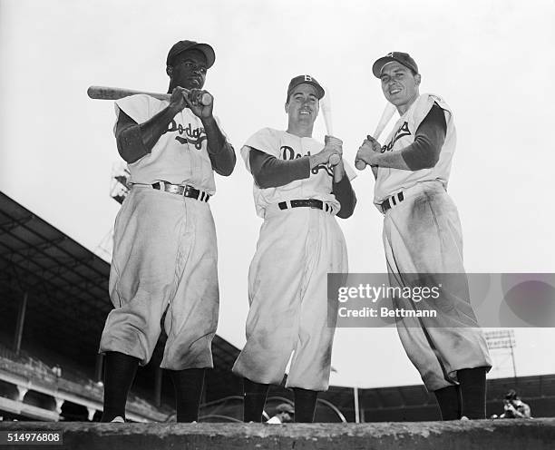 Left to right are Jackie Robinson, Duke Snider, and Gil Hodges, who were all Brooklyn Dodgers' baseball players.