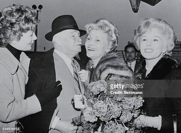 Happy Reunion. Vienna, Austria: Eva Gabor and sister Magda embrace their father, Vilmos Gabor during a joyful reunion in Vienna, October 26. The...
