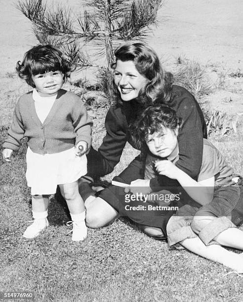 Lake Tahoe, Nevada: Seventeen-months-old Yasmin, daughter of actress Rita Hayworth and Prince Aly Khan, is shown playing with her famous mother and...