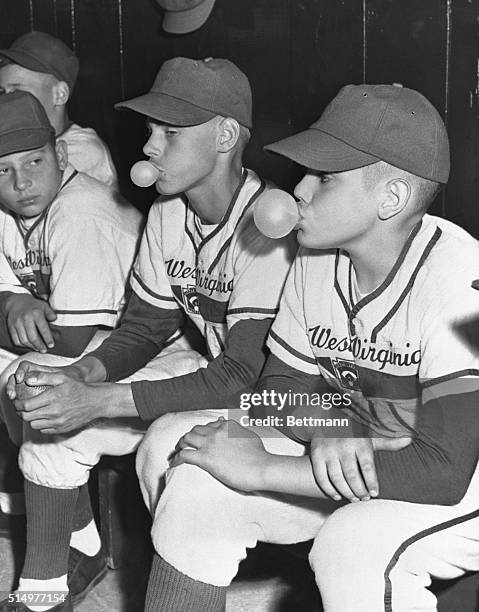 Joe Cook and Jack Moran of West Virginia's Fairmont blow bubbles while sitting in the dugout during the 1951 Little League World Series.