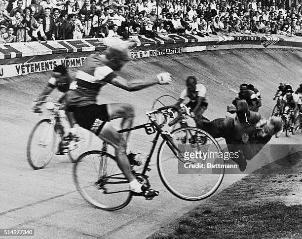 Editor's notes: Paris, July 19, 1958. 45th "Tour de France" . Dramatic fall of the French rider Andre Darrigade on the Parc des Princes track, at the...