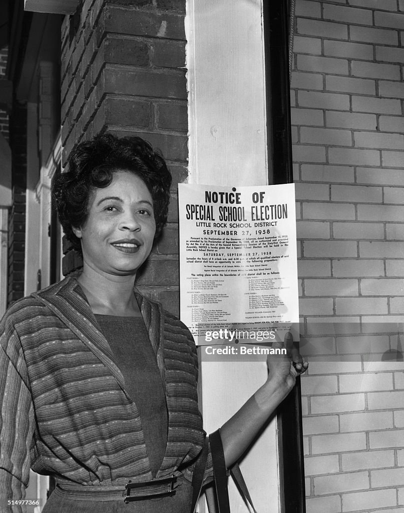 Mrs LC Bates Standing with Election Sign