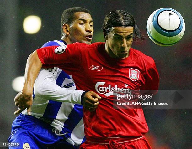 Liverpool's Milan Baros fights for the ball with Deportivo La Coruna's Mauro Silva during their UEFA Champions League Group A football matrch at...
