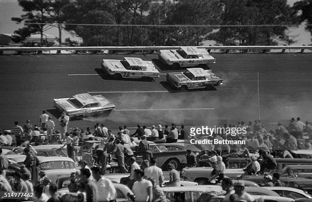 Jim McGuirk, Vero Beach, Fla. Slides down the track backwards stopping short of the crowd. McGuirk was forced out of the 500 mile NASCAR...