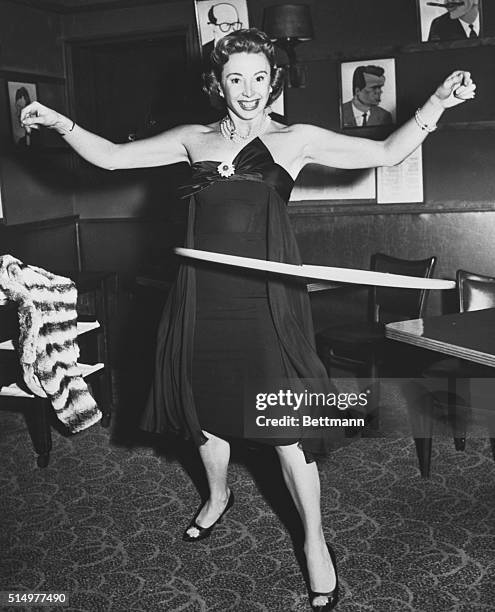 New York: Hoop-De-Do. The contest was at least good for removing the extra inches off the waist. Audrey Meadows does a solo during the Hoop Contest...