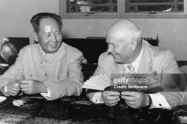 Nikita S. Khrushchev chatting with Mao Tse-Tung.