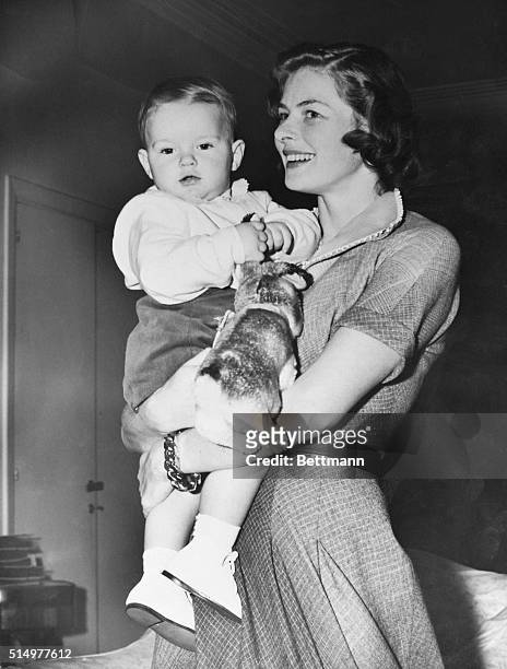 Happy Ingrid Bergman holds her 1-year-old son, Robertino, on his birthday in 1950.
