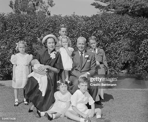 The growing family of actress Maureen O'Sullivan and director John Farrow pose for portrait following christening of their seventh child at Church of...