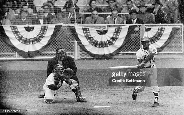 Hank Aaron of the Milwaukee Braves strikes out during the 5th game of the World Series.