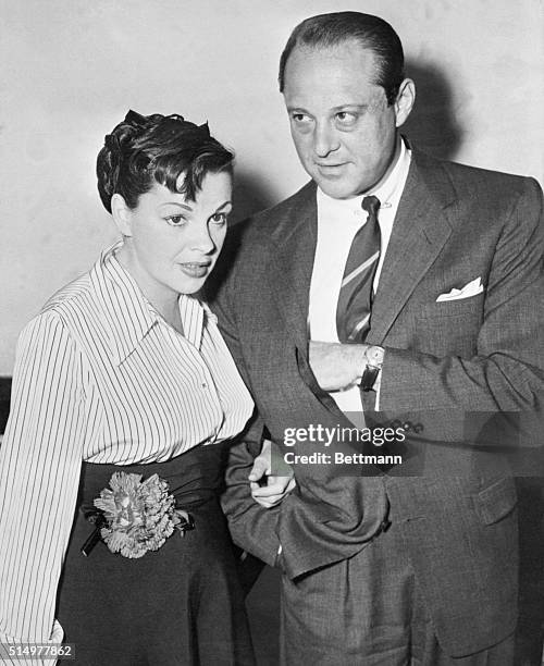 Judy Garland and her manager and boyfriend, Sid Luft, don't look too ill at ease, as they are pictured in Los Angeles Superior Court on Thursday,...