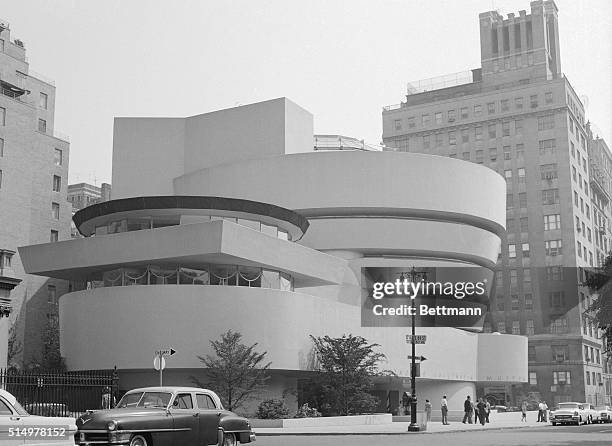 Seeing may be believing, but New York's new Gugenheim Museum can play tricks on anyone's eyesight. It's been described as a silo, a space ship, an...