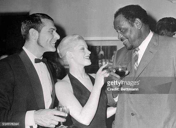 After the opening performance of Shakespeare's Othello at the Stratford Memorial theater here, the stars of the show, , Sam Wanamaker, Mary Ure, and...