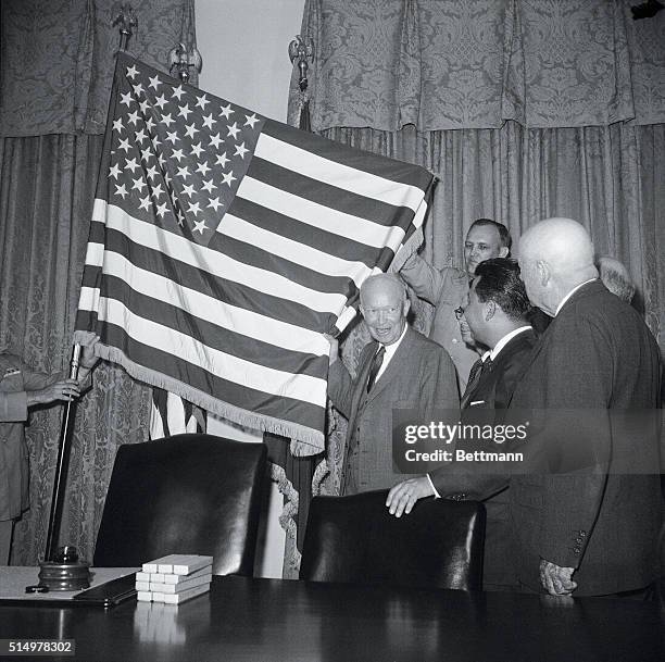 Hawaii Signed into the Union. Washington: The new 50-star flag in unfurled at the White House today after President Eisenhower signed a proclamation...