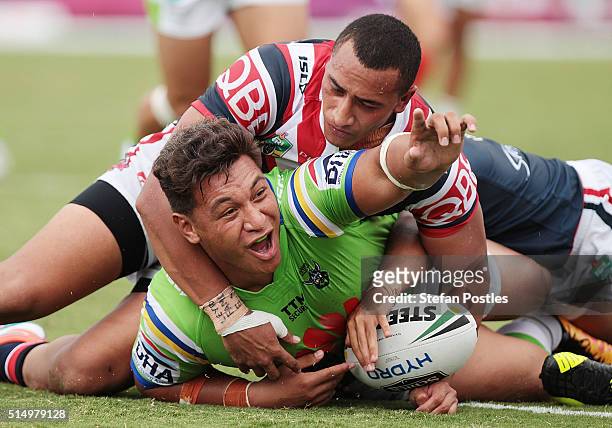 Josh Papalii of the Raiders celebrates after scoring during the round two NRL match between the Canberra Raiders and the Sydney Roosters at GIO...