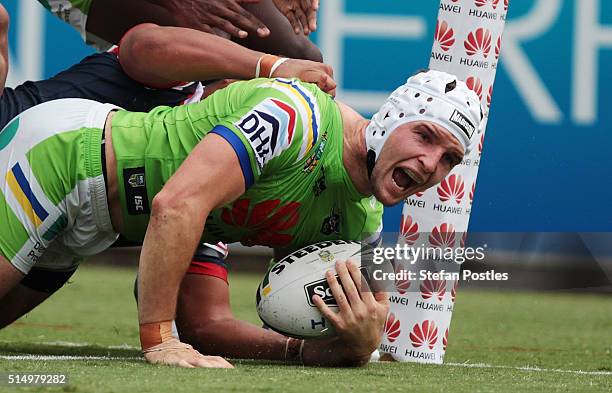 Jarrod Croker of the Raiders scores a try during the round two NRL match between the Canberra Raiders and the Sydney Roosters at GIO Stadium on March...