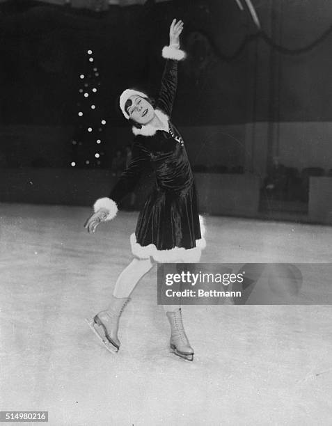 Olympic star and three times world figure skating champion Sonja Henie practices on the ice at Madison Square Garden.