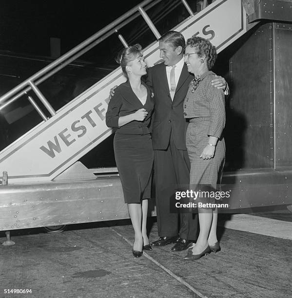 Greeted at McCarran Field by Robert Neal, Texas financier, actress Debbie Reynolds and her mother arrive in Las Vegas "just for the weekend to see...