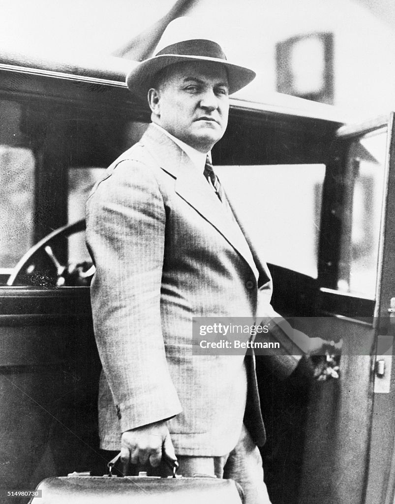 George Remus Carrying Suitcase