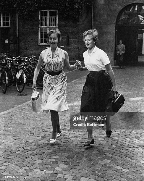 Royal Rush Act. Copenhagen, Denmark: Hurrying across the campus so not to be late for class, Princess Margrethe , heir-apparent to the Danish throne,...
