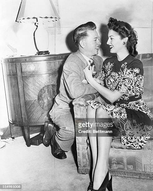 Meet the Bride and Groom - The Rooneys. Ballard, California: Mickey Rooney and his bride, actress Ava Gardner pose for cameramen after marriage...