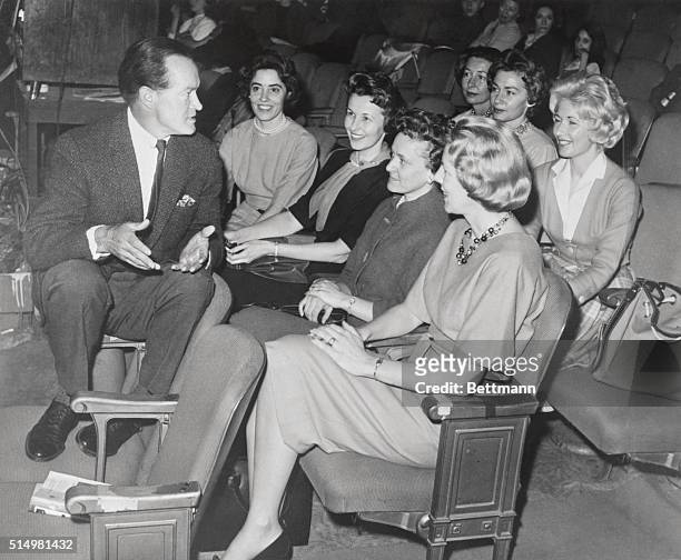 Celebrated comedian Bob Hope gets some inside information on space flight training from the wives of astronauts during a rehearsal for a special TV...