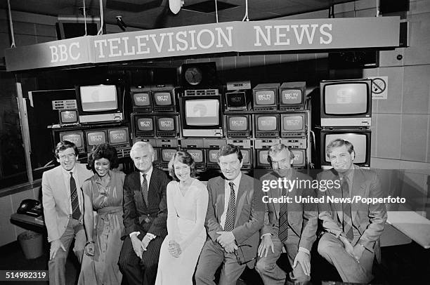 Members of the BBC newscasting team posed together in the news room at Television Centre in London on 28th August 1981. From left to right: Richard...