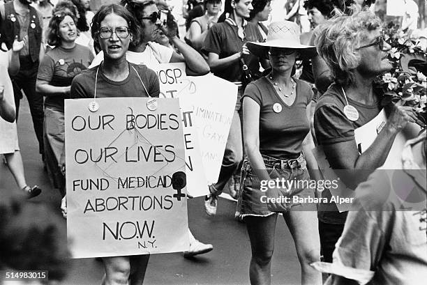 Pro-choice protestors at a People's Convention in New York City, before the start of the Democratic National Convention, 10th August 1980. One woman...