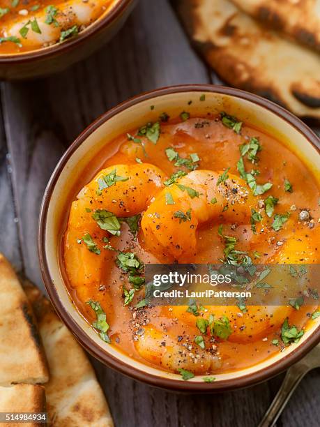 spicy red curry soup with shrimp and naan bread - indian food stock pictures, royalty-free photos & images
