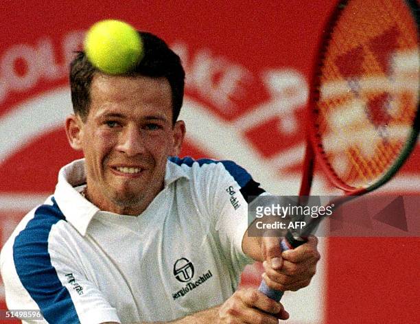 Andrei Stoliarov of Russia makes a backhand return to Andreas Vinciguerra of Sweden during their quarter final match in the ATP Gold Flake Tennis...