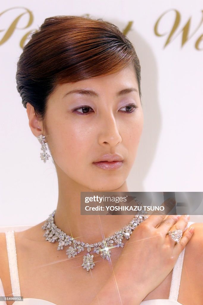 Japanese model Mariko wears a 154.56-karat diamond
