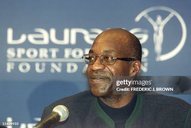 Olympic legend Edwin Moses, Chairman of the World Sports Academy, speaks at a press conference 26 January 2002 in Beijing, at the start of the first...