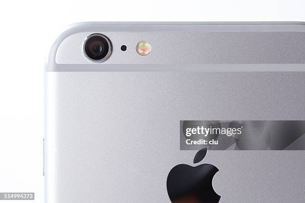 white iphone 6 plus on white background back part camera - iphone 6 stock pictures, royalty-free photos & images