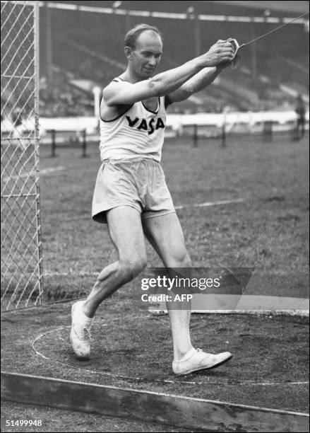 Hungarian Imre Nemeth throws hammer at the Amateur Athletics Association Championships, London 18 July 1947. A year later, Nemeth world recorder of...