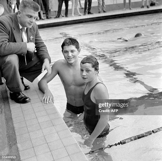 Australian swimmers Elsa and Jon Konrads train at the Tourelles swimming pool in France during a Franco-Australian meet, 03 August 1958. John Konrads...