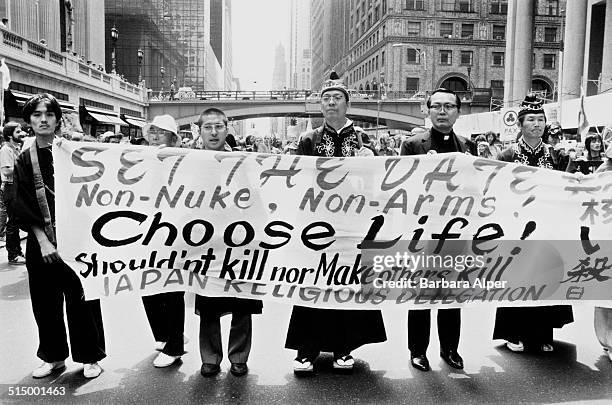 The March and Rally for Peace and Disarmament, an anti-nuclear protest in New York City, 12th June 1982. Here members of the Japanese Religious...