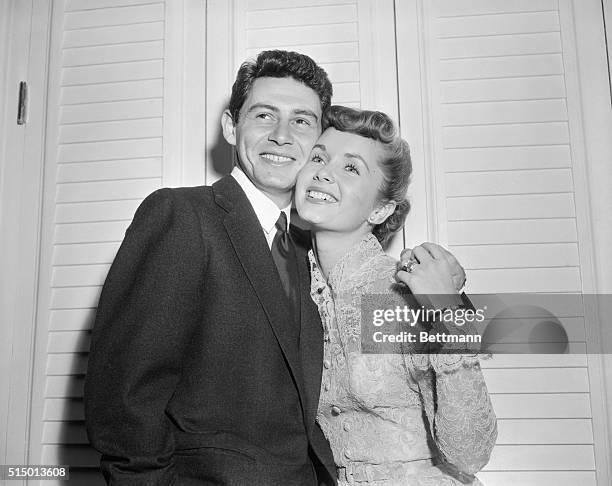 Eddie and Debbie Make it Official. Hollywood, California. With her seven karat diamond on the third finger, left hand, actress Debbie Reynolds poses...