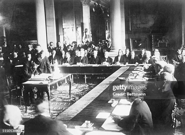 Sevres, France: Signing the Turkish Treaty with the Allies- Photo shows Haki Pacha signing. The inkstand being used is the one ordered by the Kaiser...