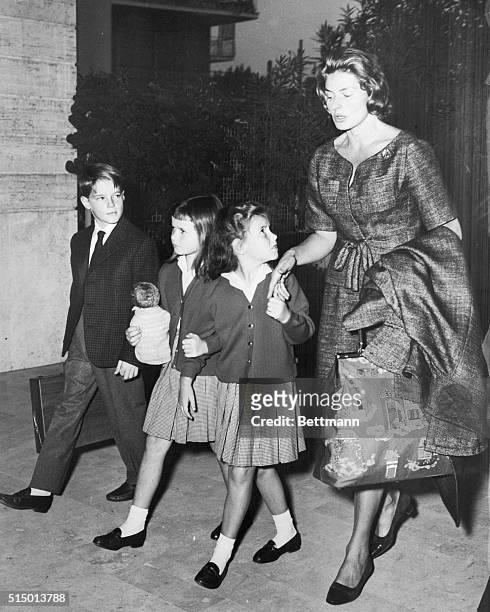 Children Returned to Ingrid. Rome: Actress Ingrid Bergman walks with her children, Robertino and twins Isotta and Isabella after they were turned...