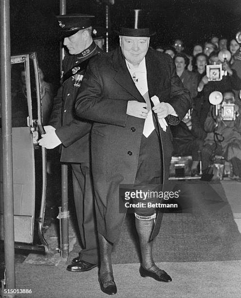 Pictured as he arrived at the Ethiopian Embassy last Friday evening is Prime Minister Sir Winston Churchill, wearing the order of the garter. The...