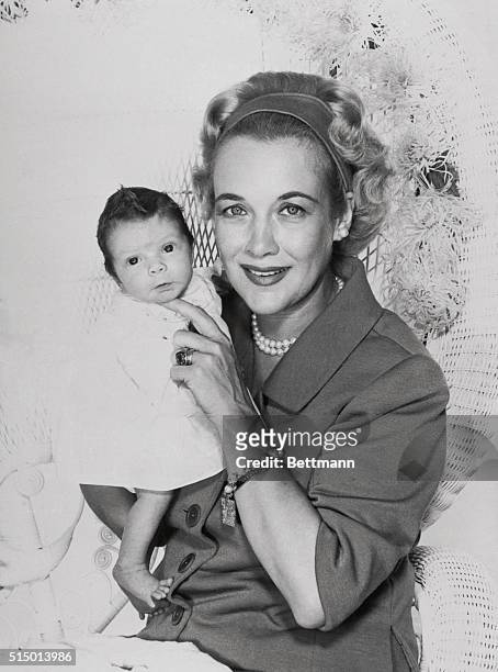 The two-week old son of Clark Gable, John Clark Gable makes his camera debut here with his mother, Kay Gable. John Clark, the only child of Gable,...